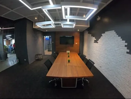 Boardroom with a screen at OutForce's Ortigas office
